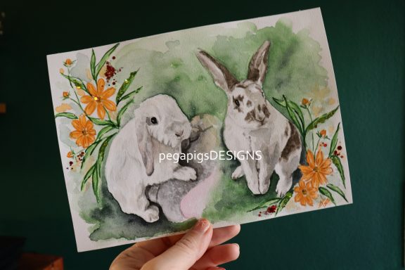 Watercolour painting of two bunnies